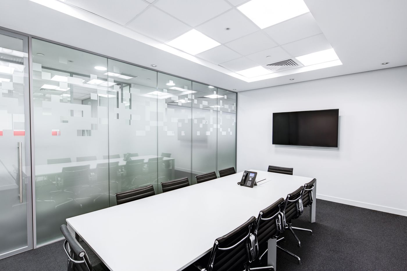 A clean, bright, organized office workspace